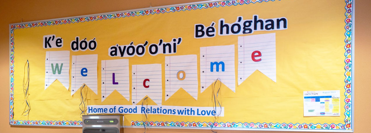 Welcome banner hanging on the wall. 