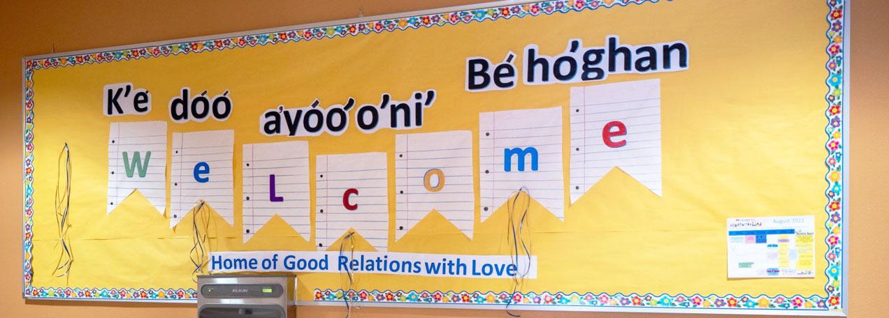 Welcome banner hanging on the wall. 